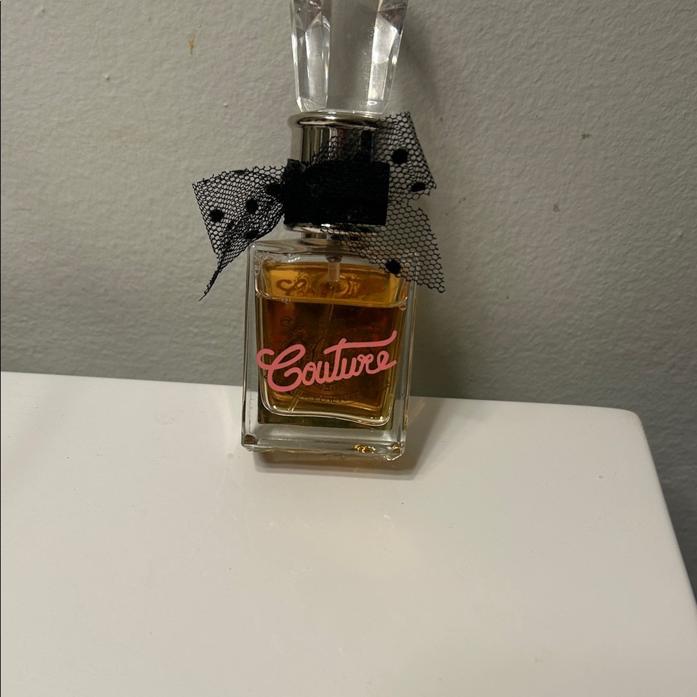 Juicy Couture Fragrance with Black Bow and Pink Lettering